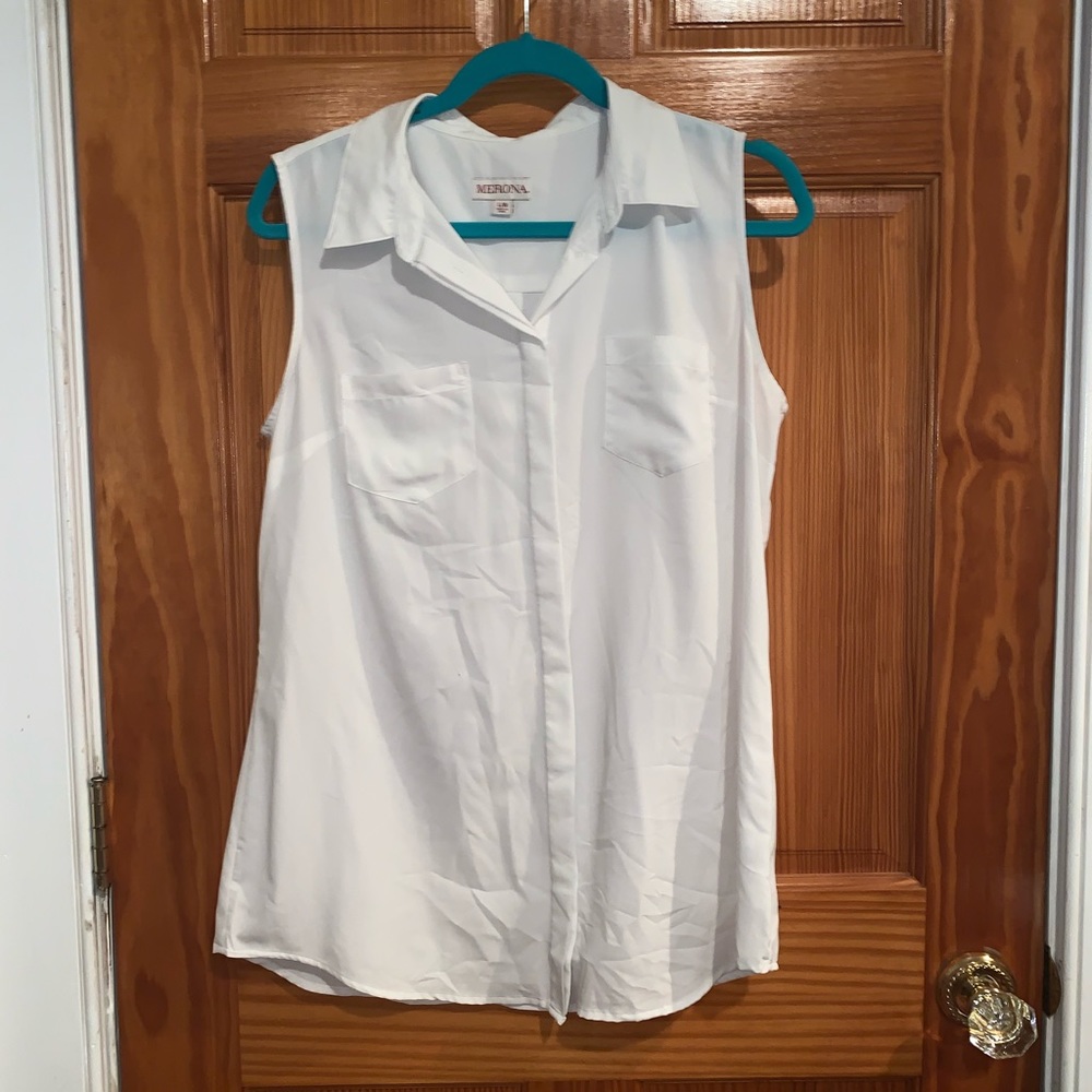 Sleeveless white button down blouse
